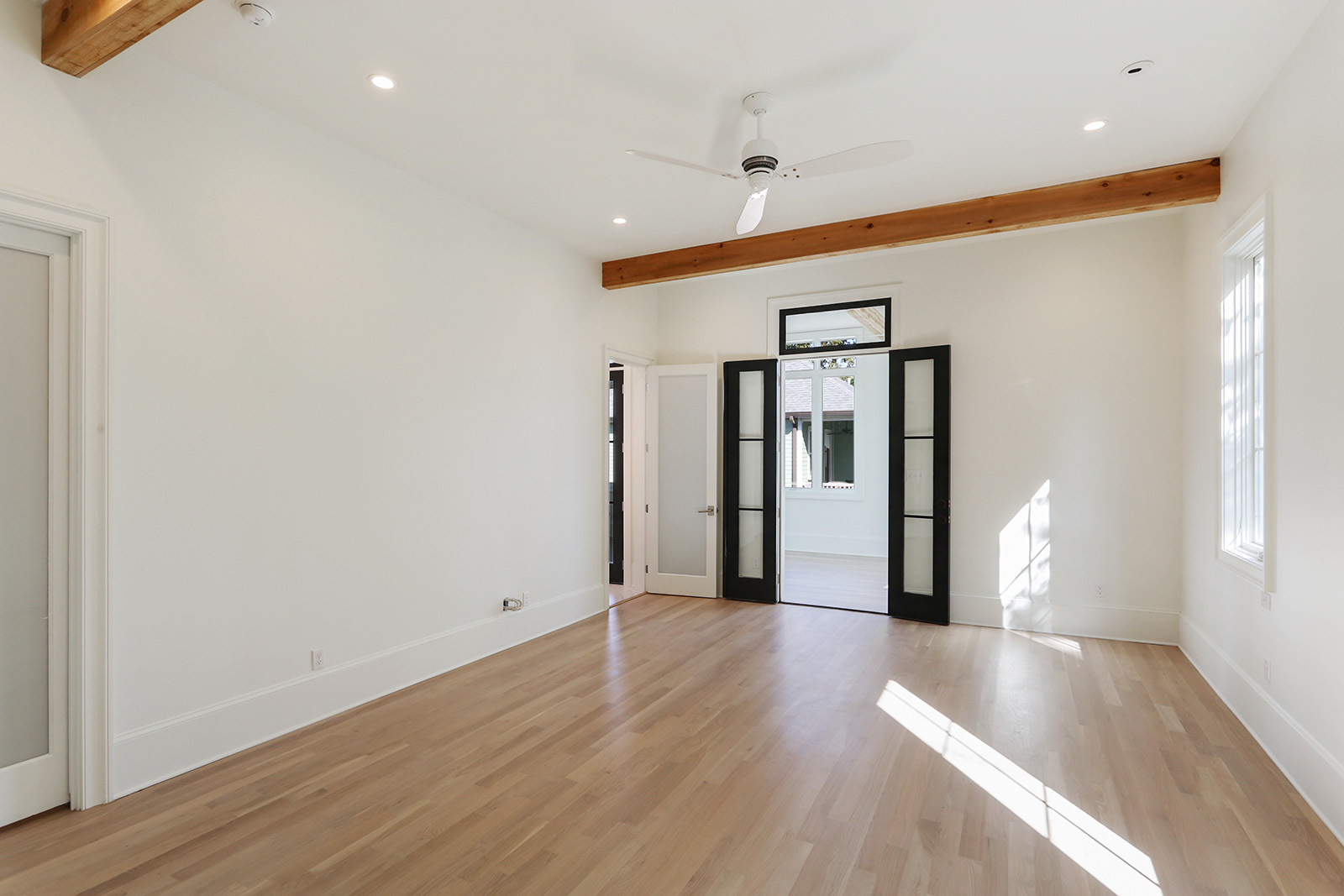 Annunciation House Bedroom Luxury Home Addition designed and built by DMG Design+Build