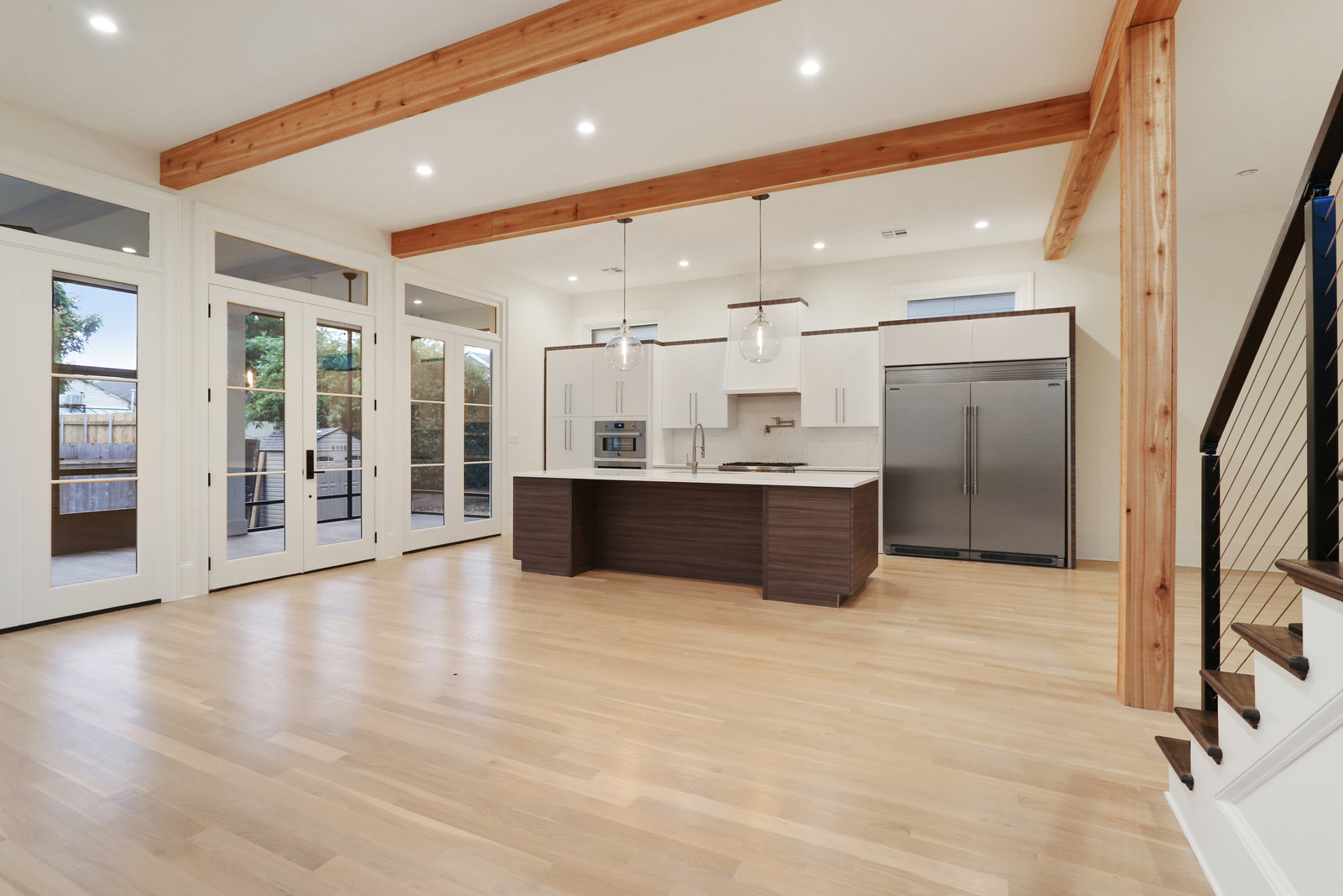 Annunciation House Open Concept Kitchen and Living Room Luxury Home Addition designed and built by DMG Design+Build