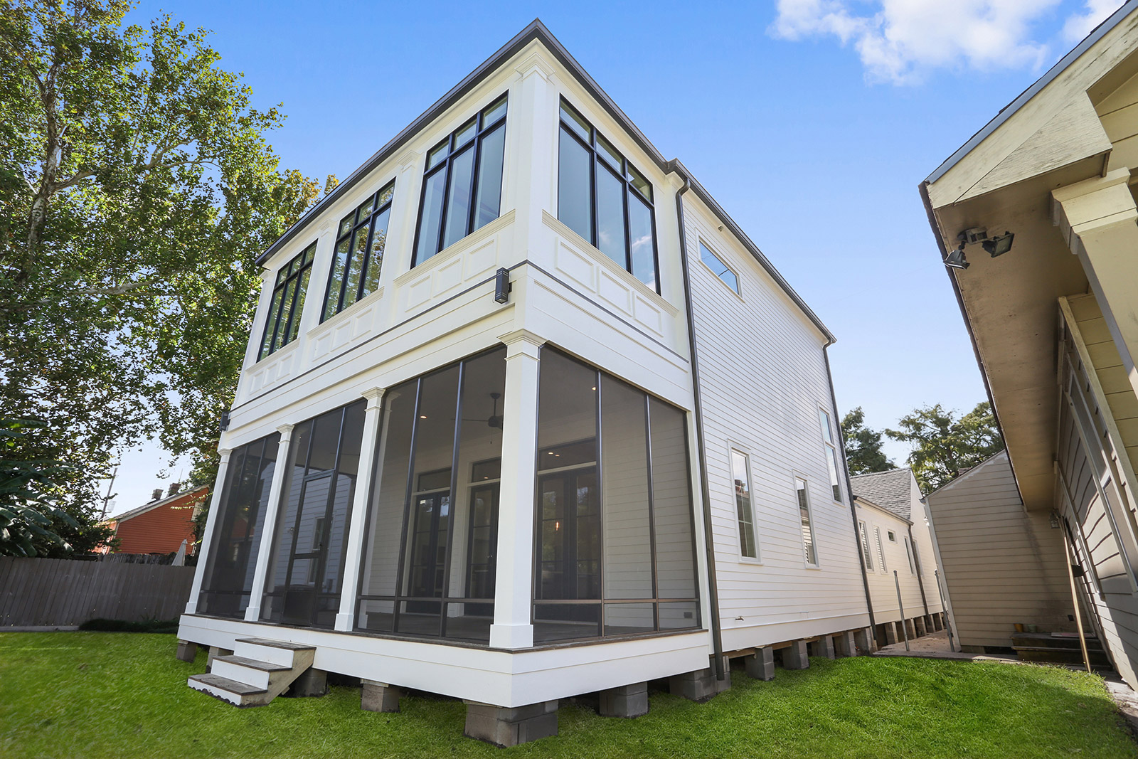 Annunciation House Back Porch Exterior Renovation designed and completed by DMG