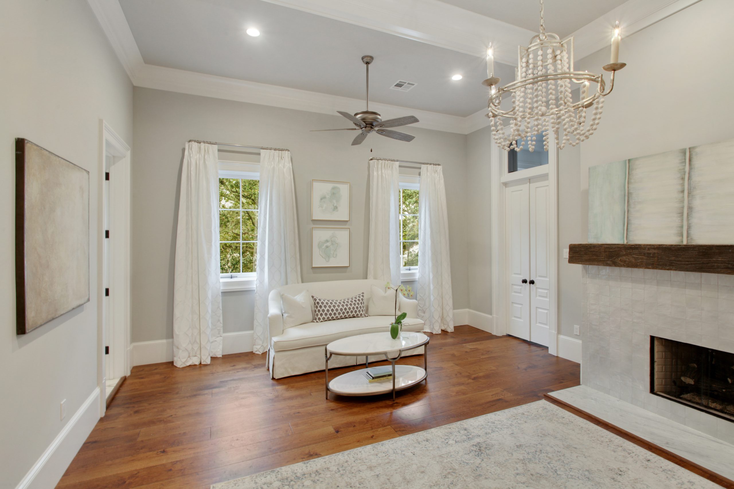 Primary Suite Bedroom Sitting Area of Audubon House luxury new construction custom home designed and built by DMG