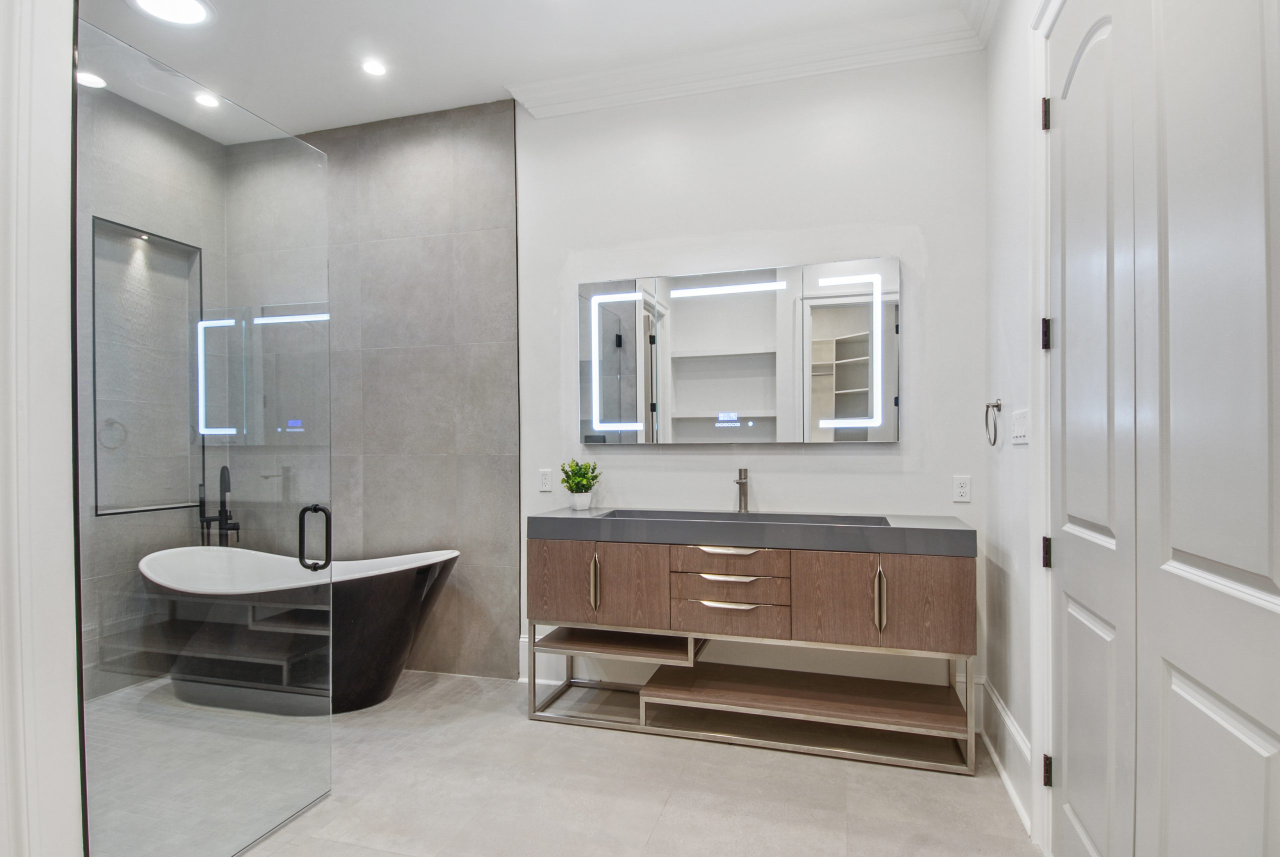 Primary Suite bathroom in Dogwood House luxury new construction custom home designed and built by DMG