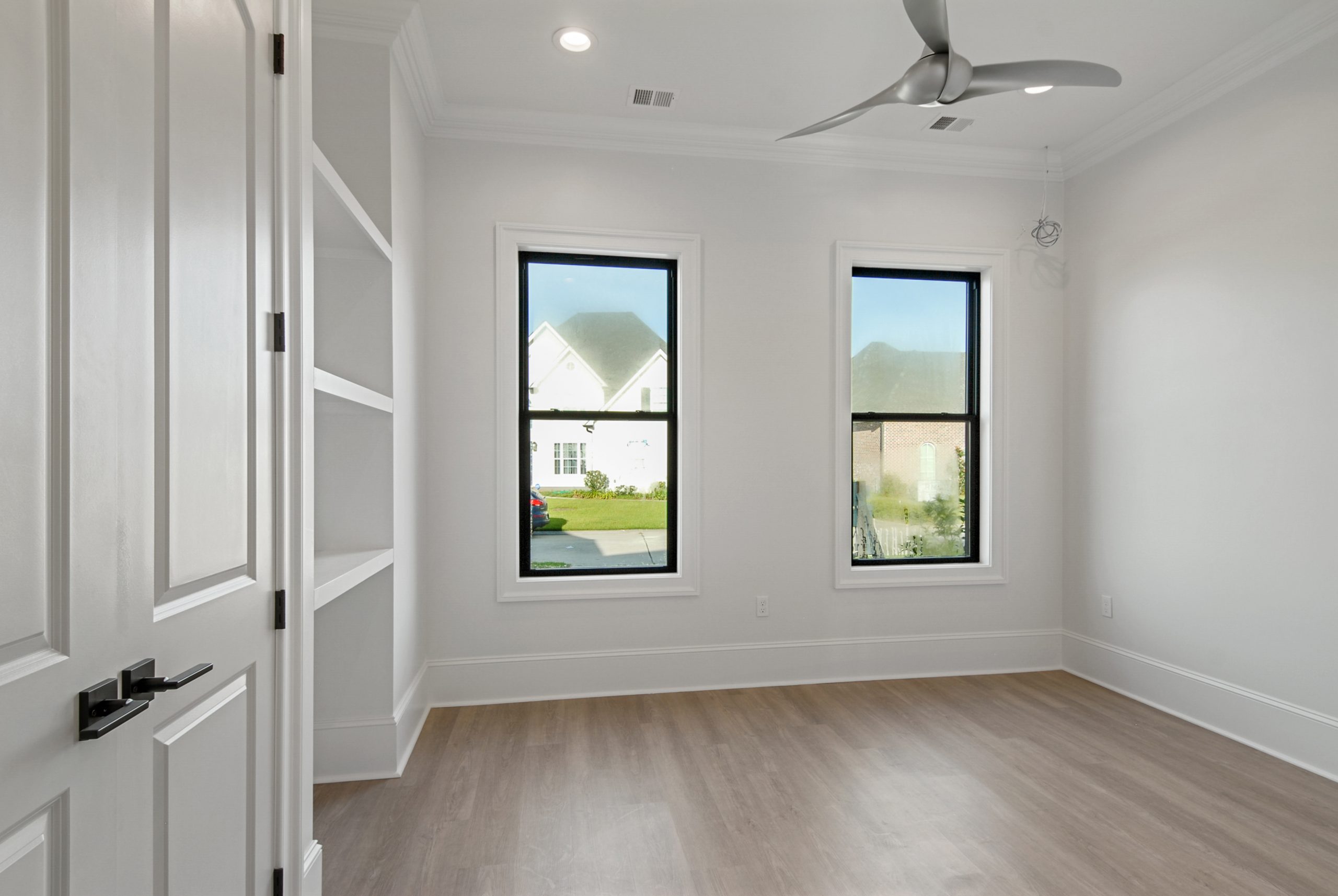 Bedroom in Dogwood House luxury new construction custom home designed and built by DMG