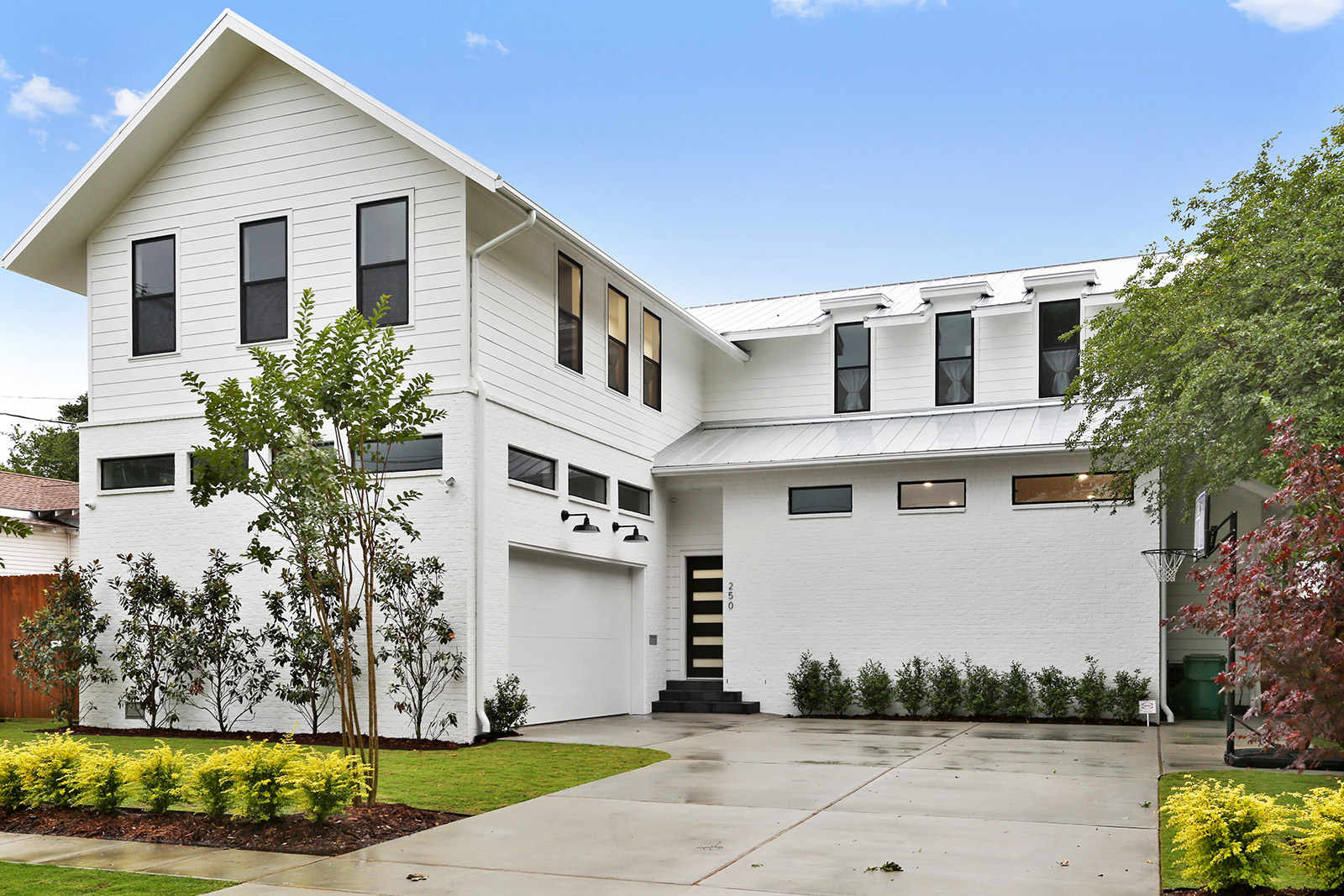 Exterior of Elmeer House luxury new construction custom home designed and built by DMG Design+Build