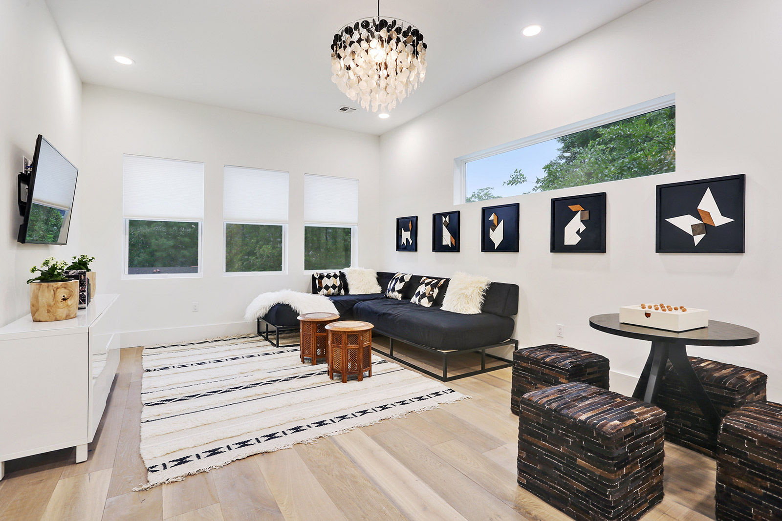 Family Room of Elmeer House luxury new construction custom home designed and built by DMG Design+Build