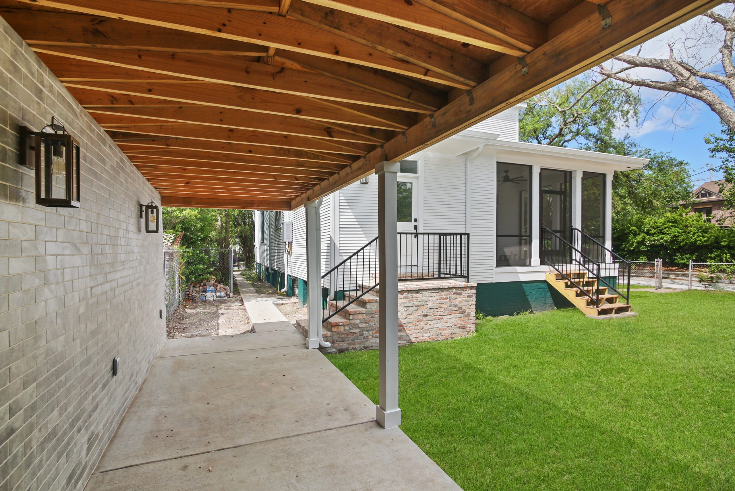 Grand House Car Port Exterior Renovation designed and completed by DMG