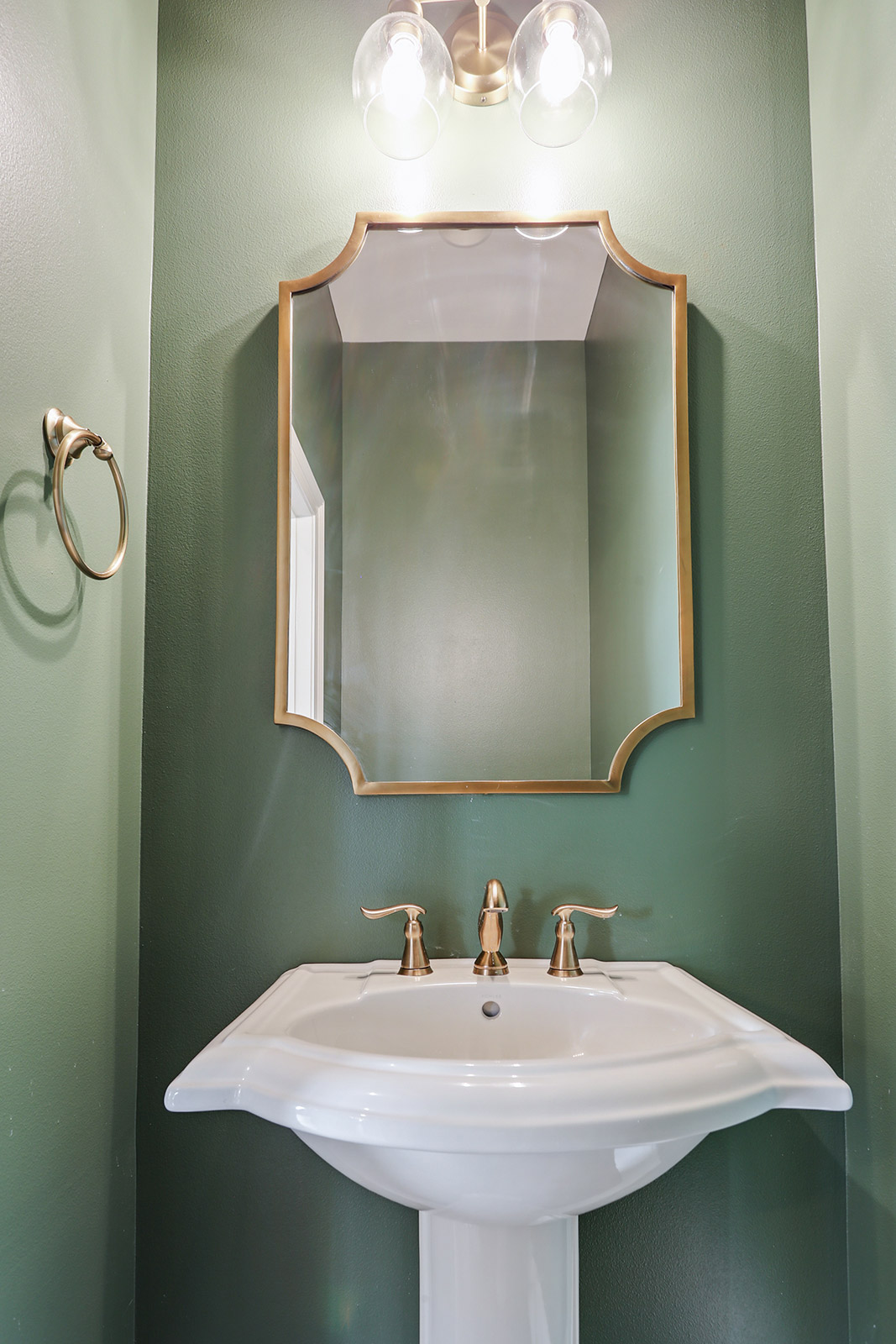 Powder room in Patterson House luxury new construction custom home designed and built by DMG