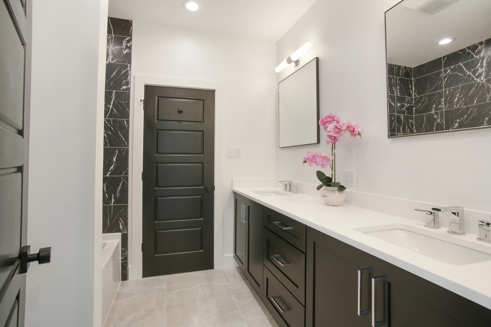 bathroom in Pratt House new construction custom home designed and built by DMG Design+Build