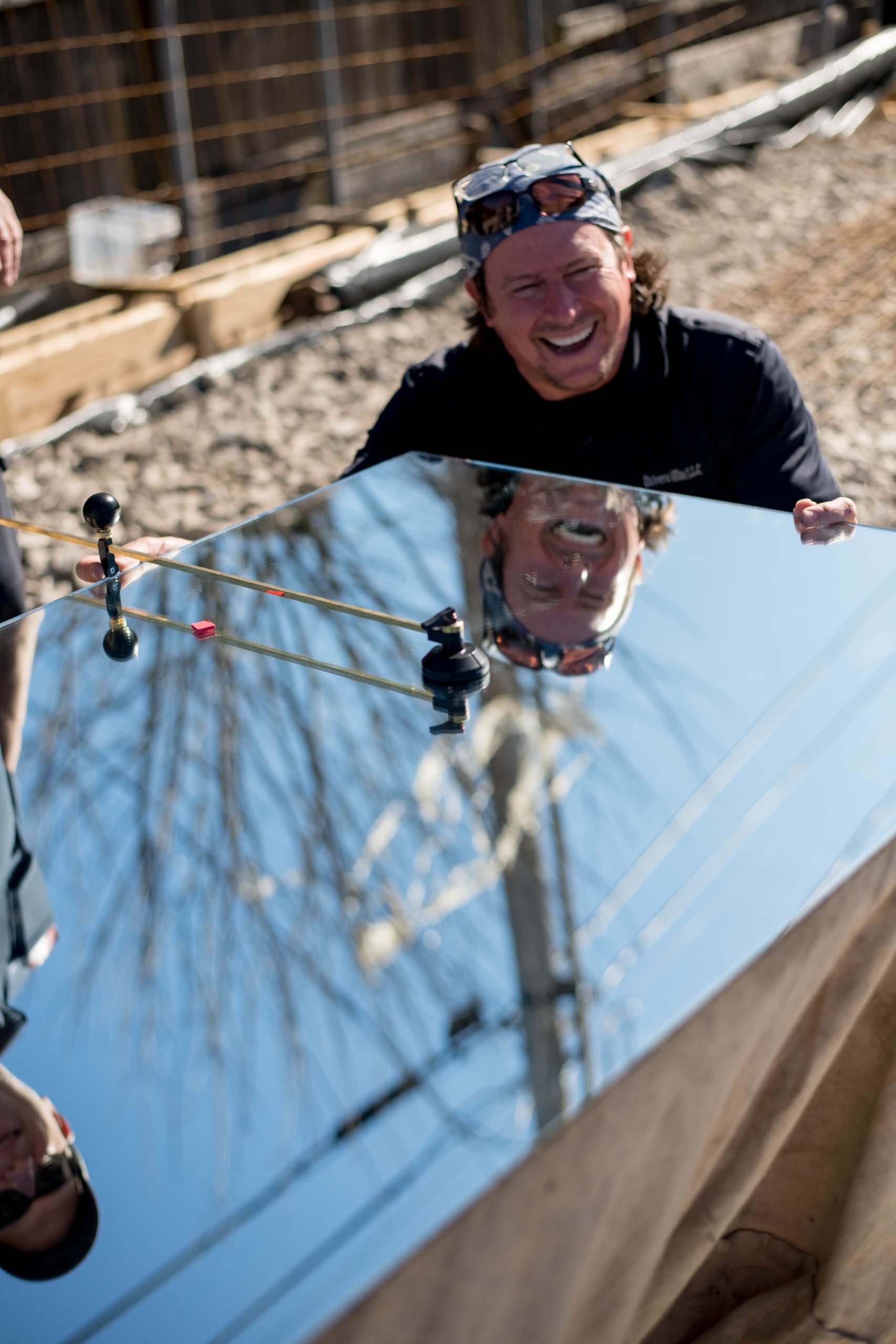 DMG Construction Worker Installing a Window on a new home