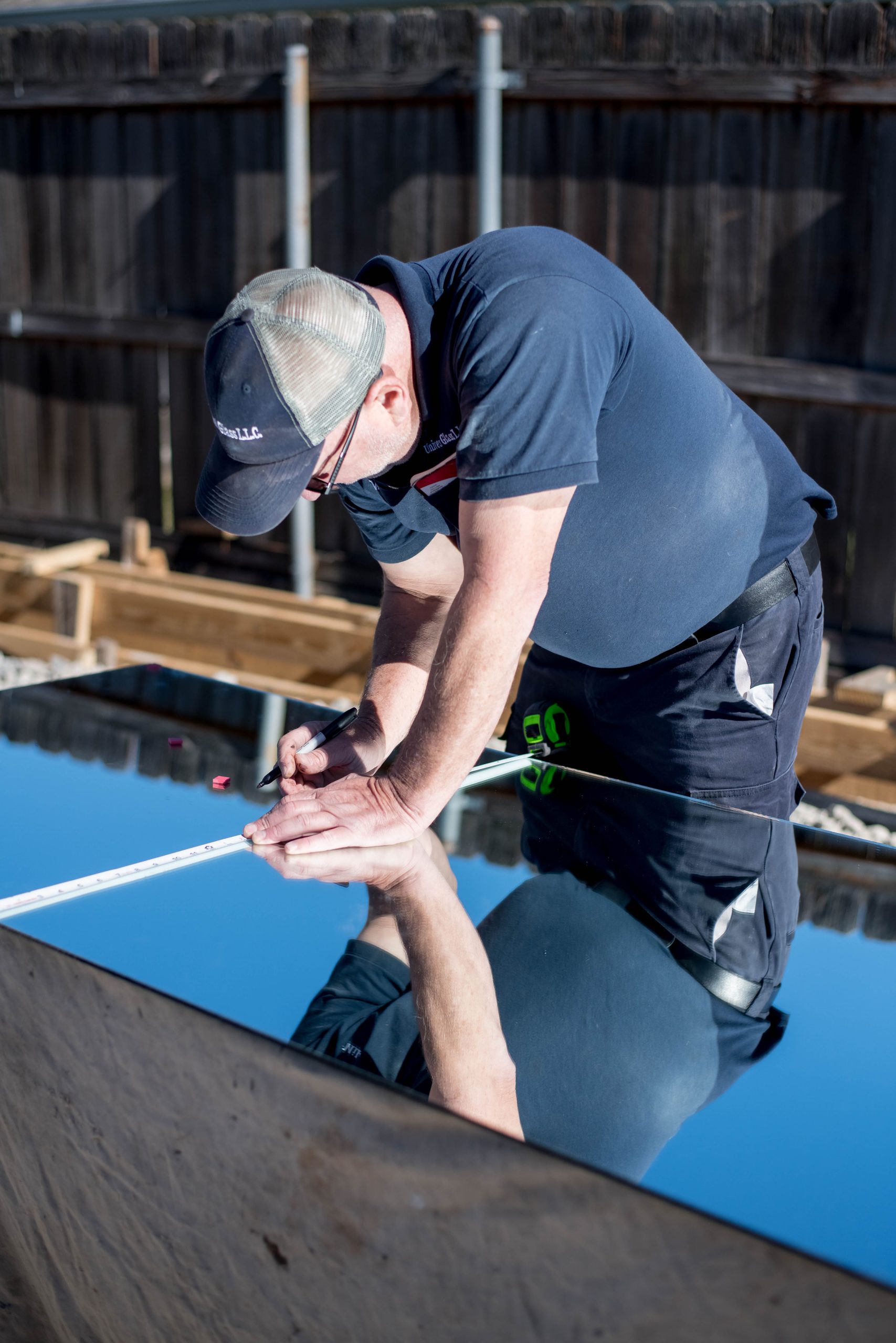 DMG Construction Worker Installing a Window on a new home